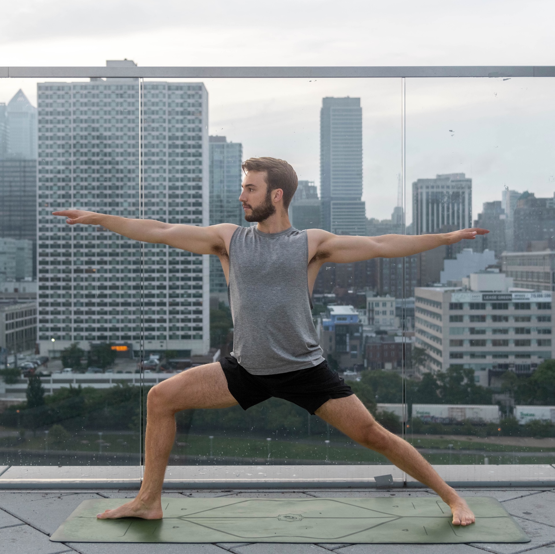 Rob in Warrior II pose